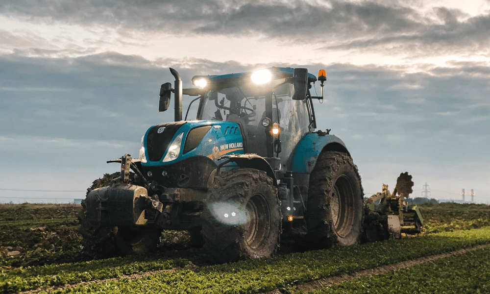 new holland tractor working in a field